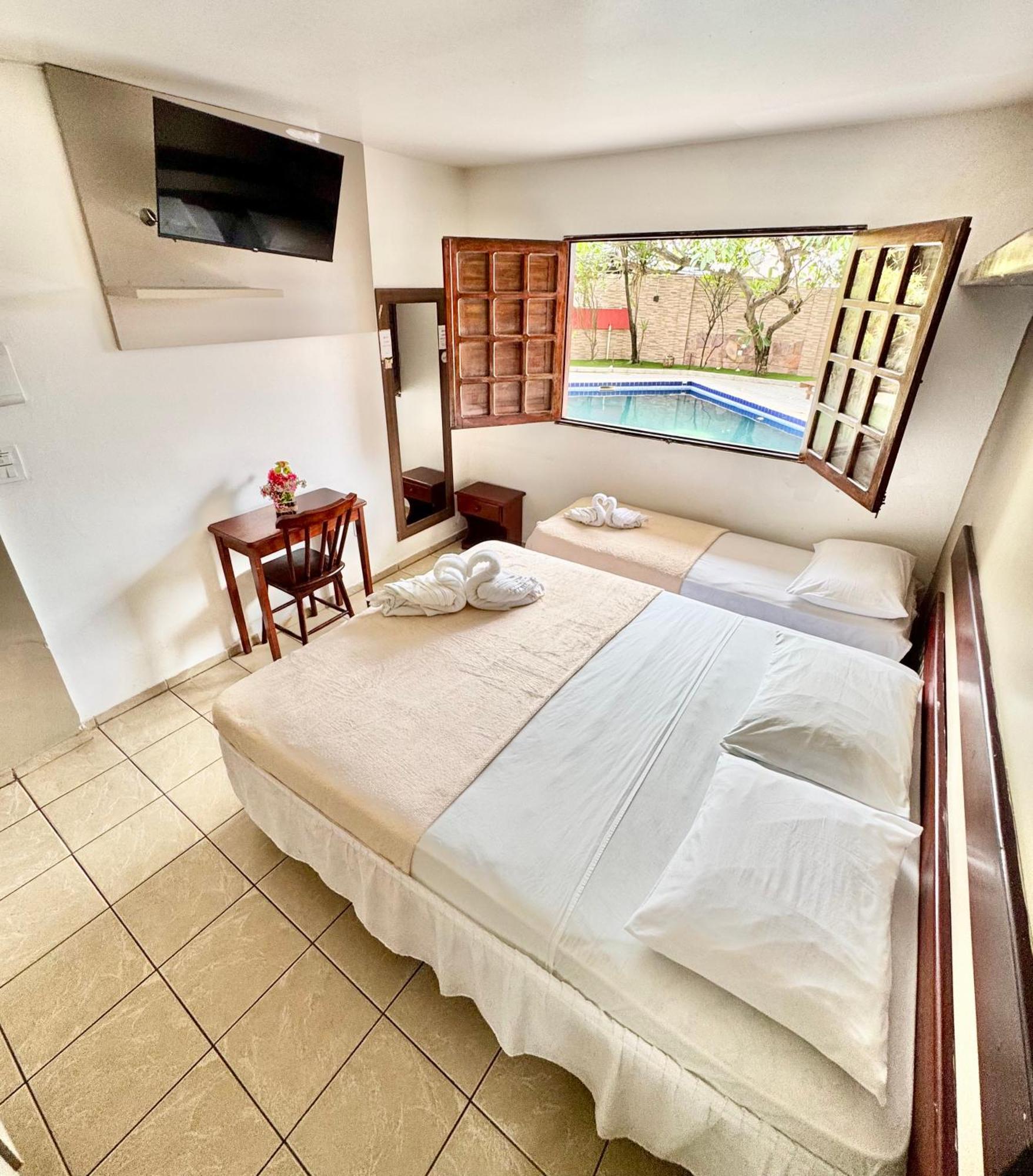 Quarto Familiar com Vista Jardim